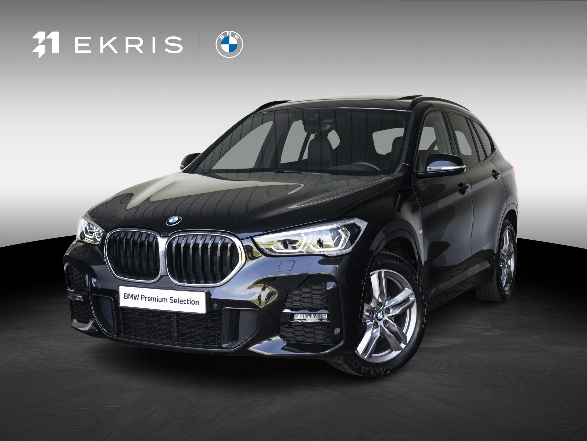 BMW X1 sDrive18i | M Sportpakket | Achteruitrijcamera | Pano, Auto's, Gebruikt, Met garantie (alle), Zwart, 3 cilinders