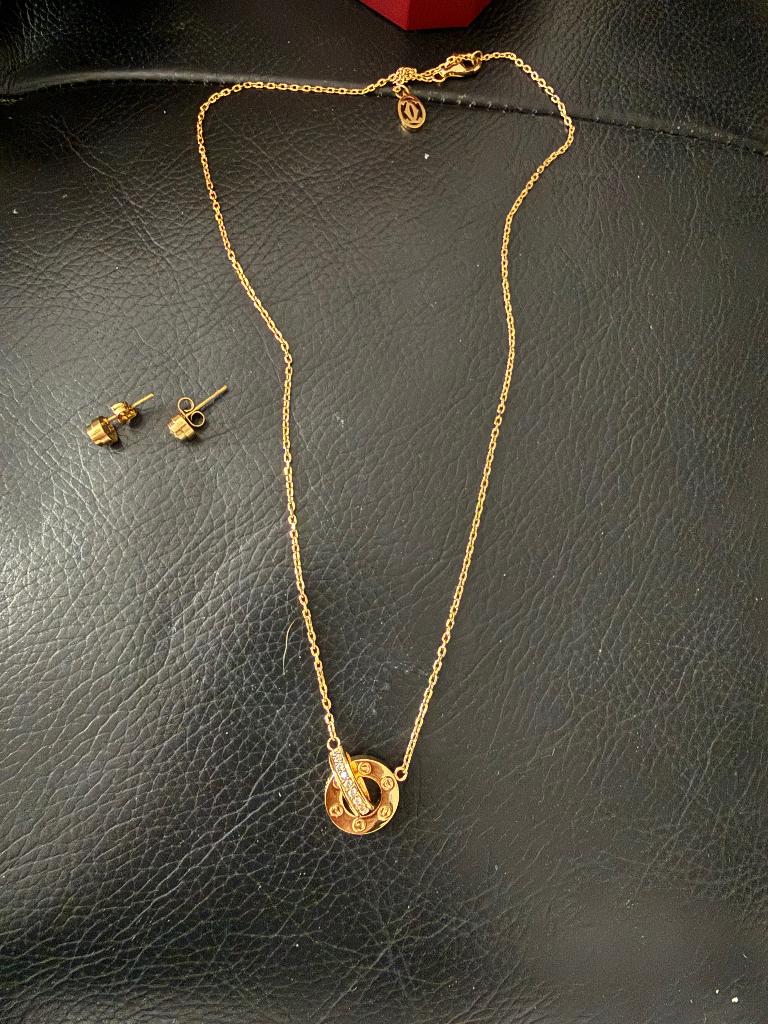cartier oorbellen en ketting, Verzenden, Gebruikt, Goud, Overige materialen