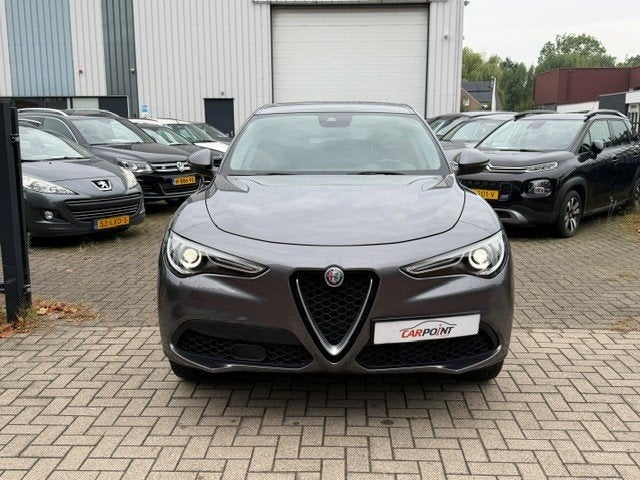 Alfa Romeo Stelvio 2.0 T AWD Q4 200PK Leer Navi Trekhaak Key, Auto's, Automaat, Dealer onderhouden, 4 cilinders, Bedrijf