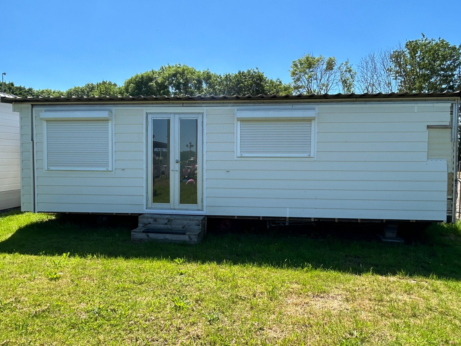 Chalet/stacaravan/mobile home/ tiny house/woonunit, Ophalen