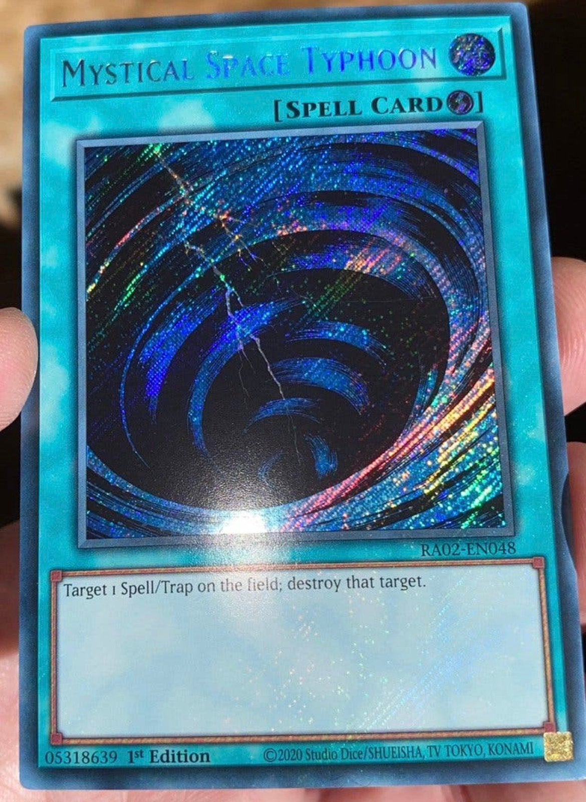 Yu-Gi-Oh! Mystical Space Typhoon RA02 1st Edition !, Ophalen of Verzenden, Zo goed als nieuw, Losse kaart, Foil