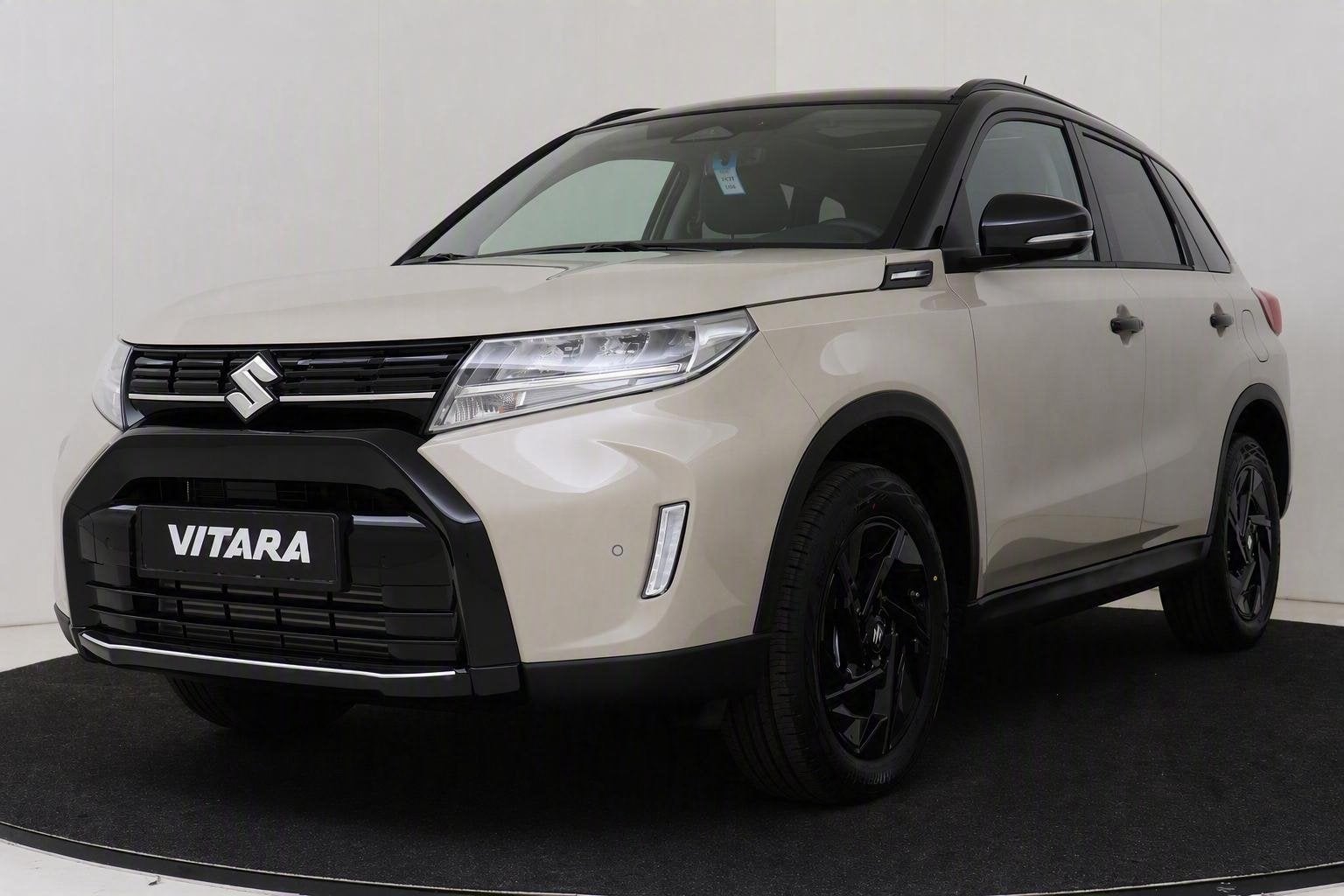 Suzuki Vitara 1.4 Boosterjet Smart Hybrid 60th Special Editi, Auto's, 12 maanden, Zwart, 4 cilinders, Beige