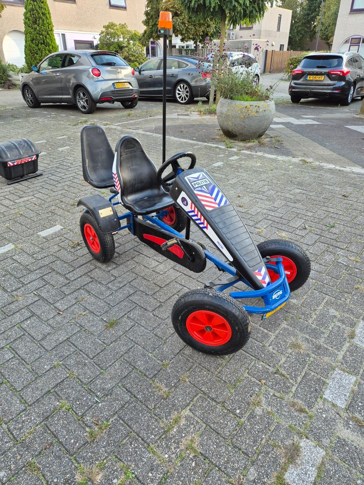 Berg skelter met 2 verstelbare stoeltjes en oranje zwaailamp