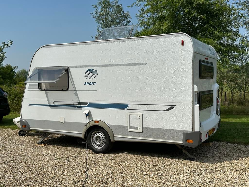 Knaus Sport 400: Ideale Gezinscaravan met Stapelbed, Stapelbed, 750 - 1000 kg, Particulier, 4 tot 5 meter