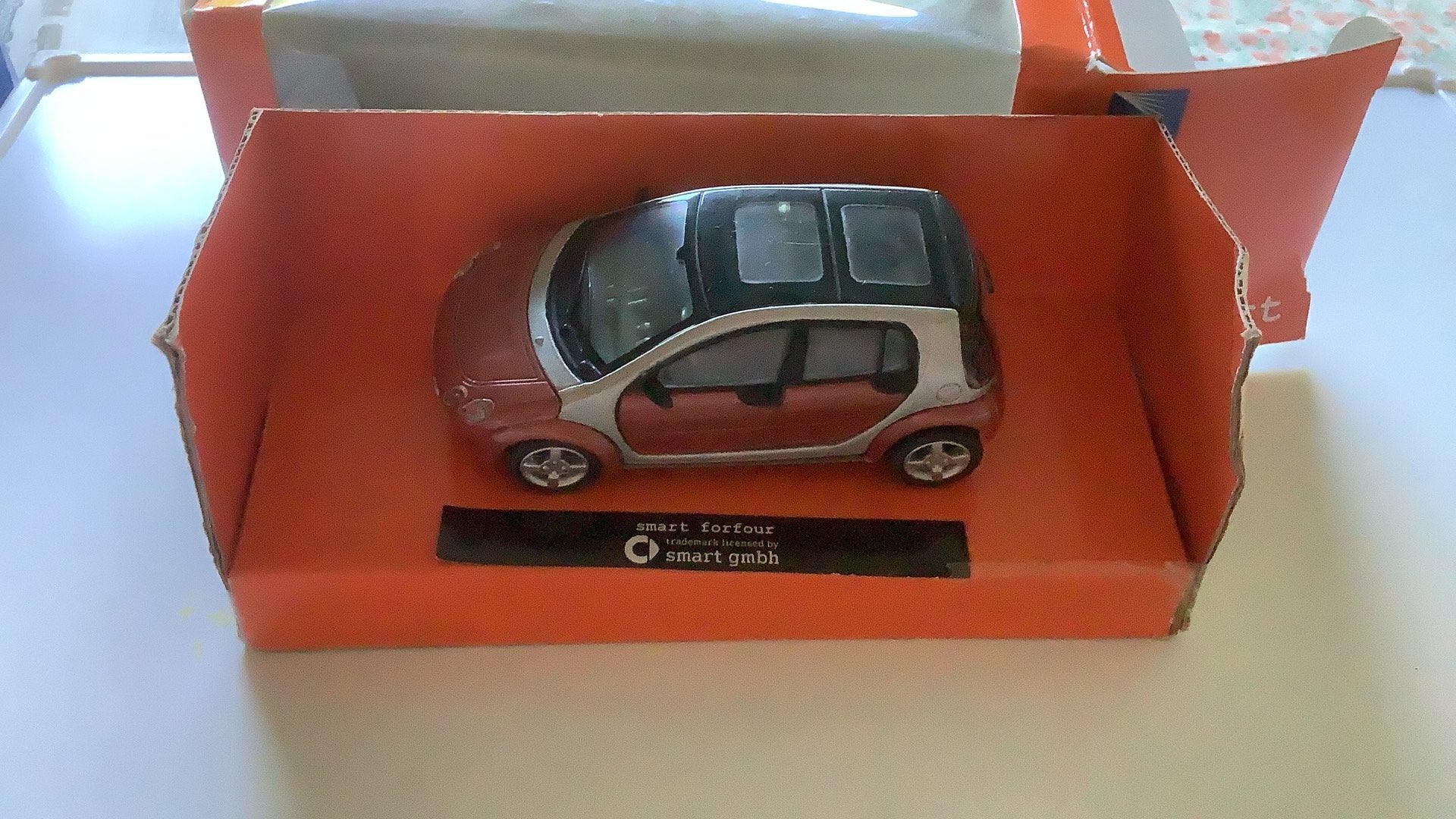 Smart Forfour NewRay. 1/43 in originele verpakking. Nieuw., Ophalen of Verzenden, Zo goed als nieuw, Auto, Overige merken