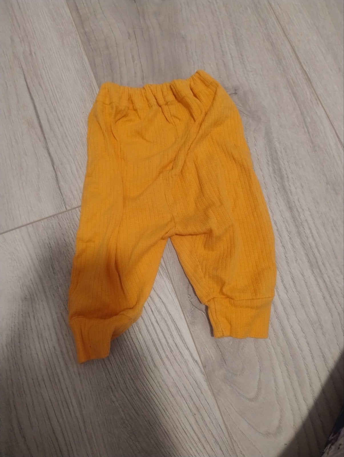 Comfortabele oranje babybroek, Ophalen of Verzenden, Gebruikt, Onbekend, Jongen of Meisje
