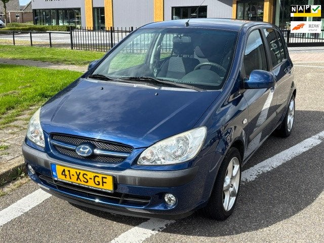 Hyundai Getz 1.4i Active Joy 5-Drs Airco Electric pakket Aud, Auto's, Voorwielaandrijving, Dealer onderhouden, 4 cilinders, Blauw