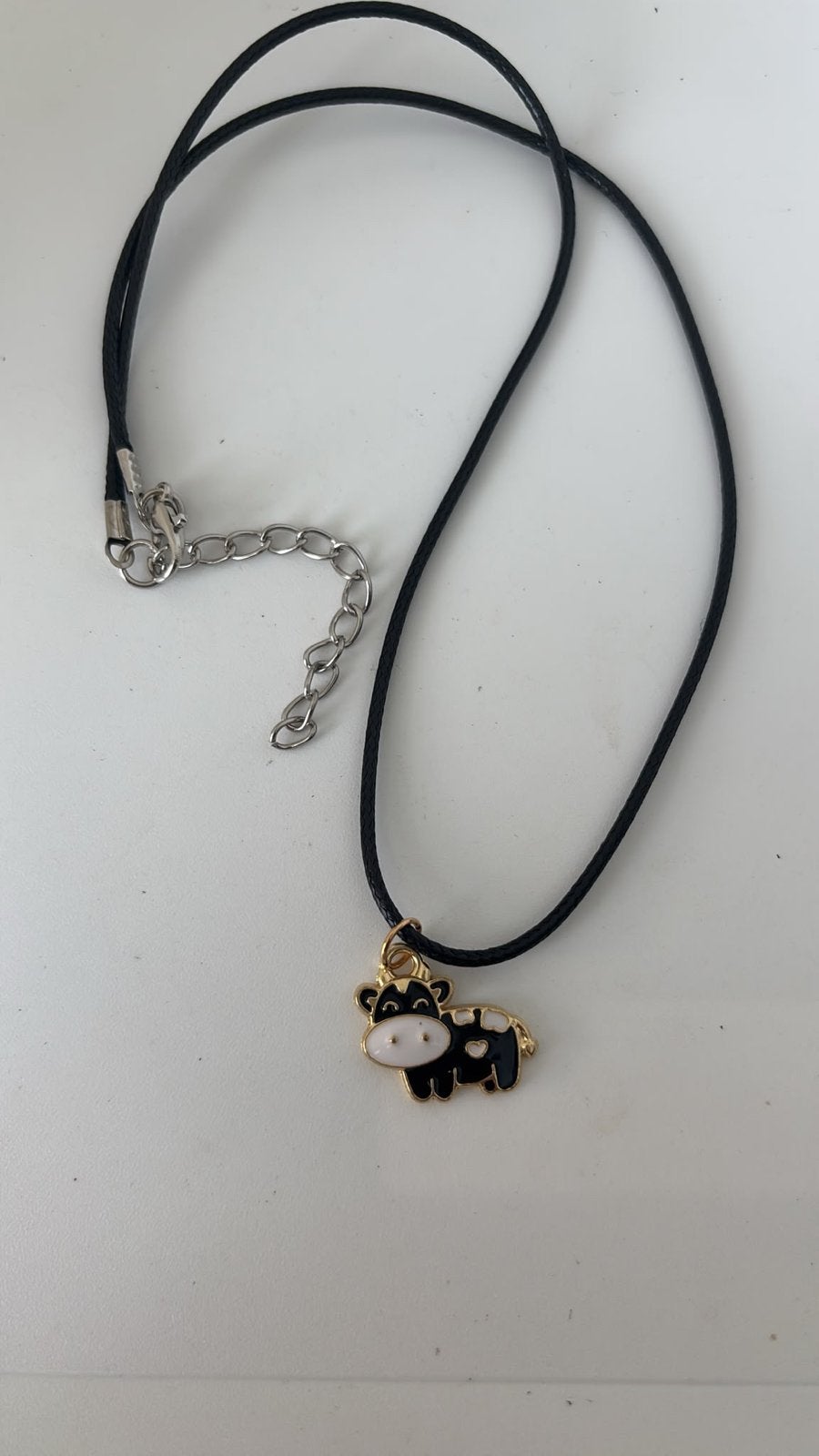 Nieuwe ketting met koe hanger - Zwart/Wit, Zwart, Nieuw, Ophalen of Verzenden, Overige materialen