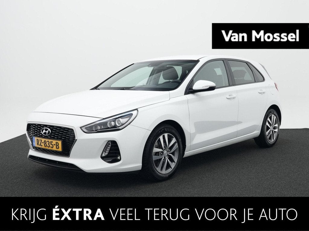Hyundai i30 1.0 T-GDI Premium | All Season Banden | Cruise C, Auto's, Hyundai, 12 maanden, Euro 6, Leder en Stof, Wit