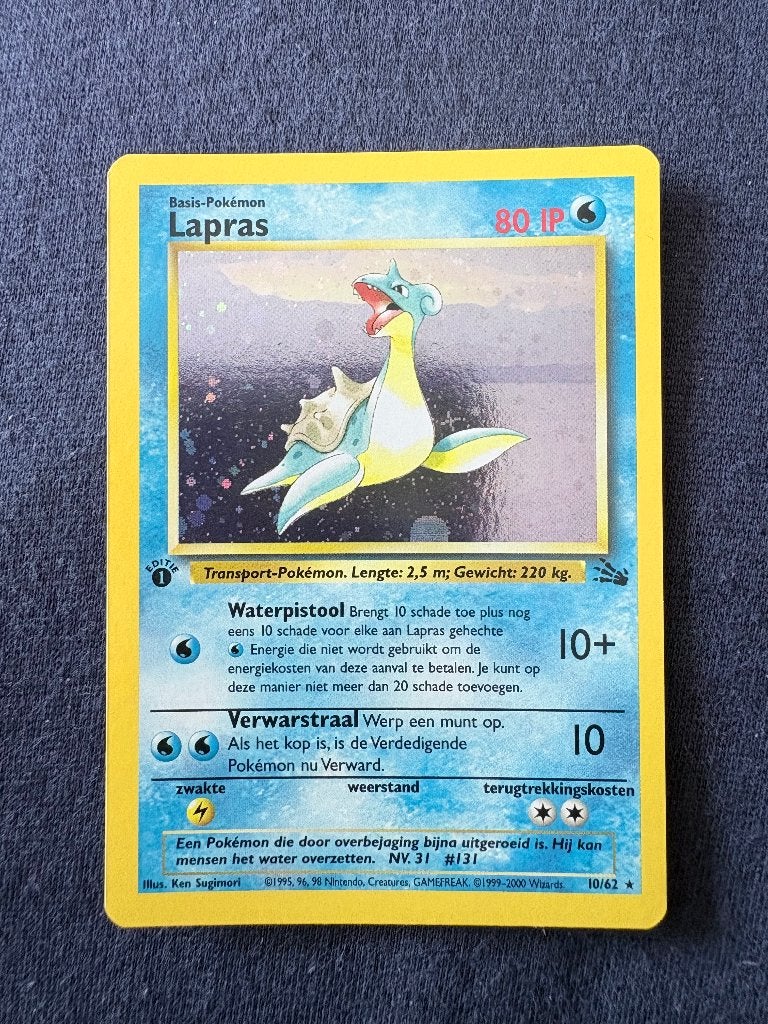 Lapras 1st Edition Holo - Fossil 10/62 - Mint, Ophalen of Verzenden, Zo goed als nieuw, Losse kaart, Foil