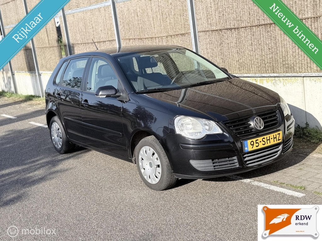 Volkswagen Polo 1.4-16V Comfortline NAP/AIRCO/NETTE AUTO/RUI, Auto's, Voorwielaandrijving, Zwart, Origineel Nederlands, Handgeschakeld
