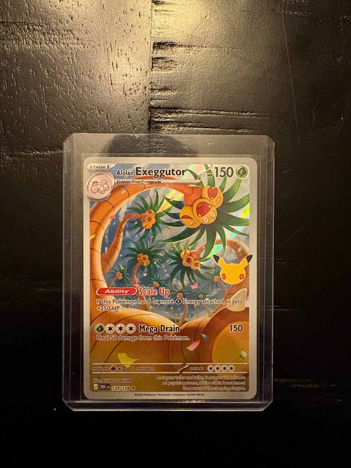 Alolan Exeggutor 129/128 Celebrations Pokémon kaart, Ophalen of Verzenden, Zo goed als nieuw, Losse kaart