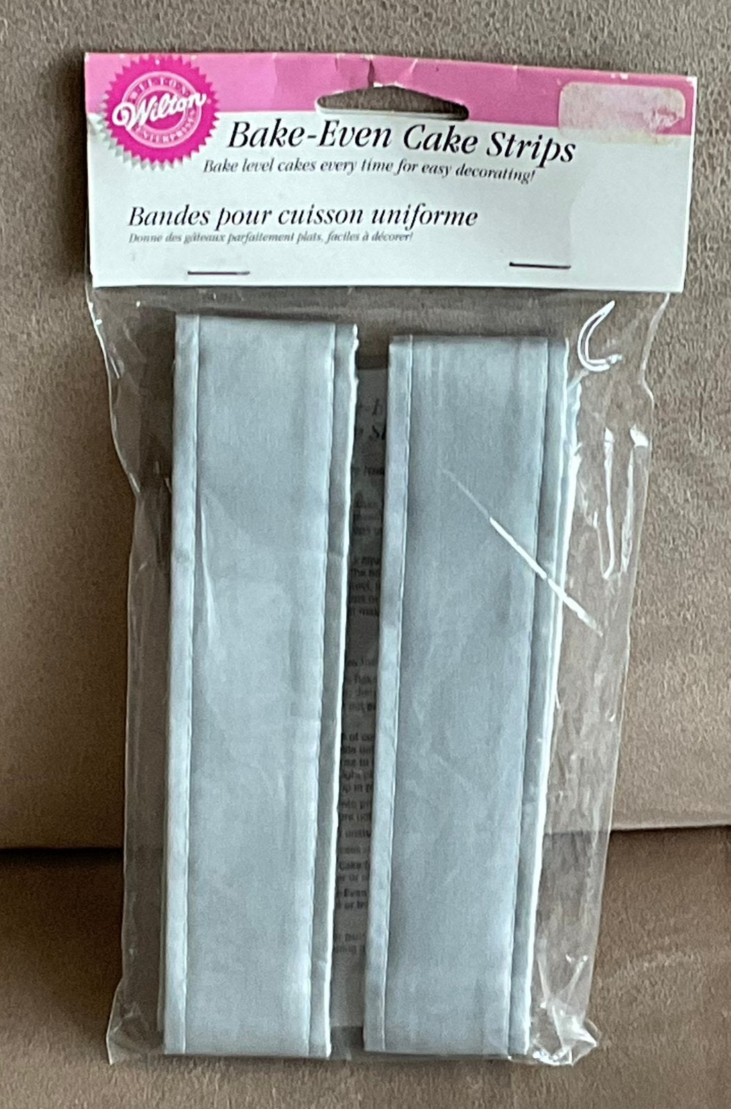 Wilton bake-even/bakriem taart-cake strips (nieuw), Ophalen of Verzenden, Nieuw, Taarten