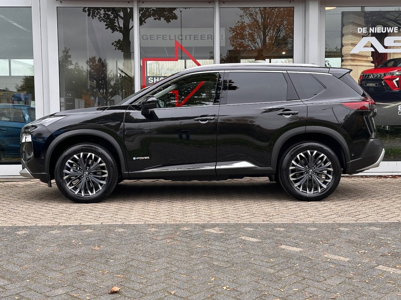 Nissan X-Trail E-Force 4WD Tekna 7-Persoons | Trekgewicht 1., Auto's, Nissan, 12 maanden, 1497 cc, Gebruikt, Zwart