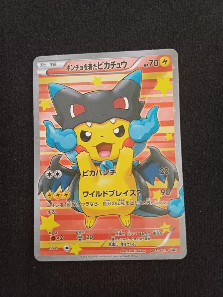 Pokémon Poncho-wearing Pikachu M Charizard, Hobby en Vrije tijd, Verzamelkaartspellen | Pokémon, Ophalen of Verzenden, Losse kaart