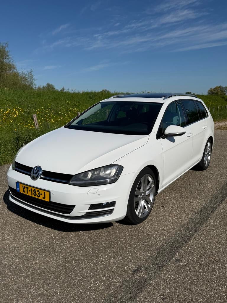 Volkswagen Golf 1.4 TSI 103KW Variant DSG 2014 Wit, Auto's, 680 kg, 4 cilinders, Wit, 1500 kg