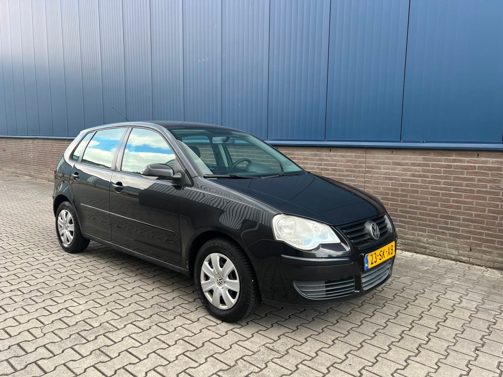 Volkswagen Polo 1.4 55KW 2006 Zwart, Auto's, Volkswagen, Voorwielaandrijving, 15 km/l, Zwart, Origineel Nederlands