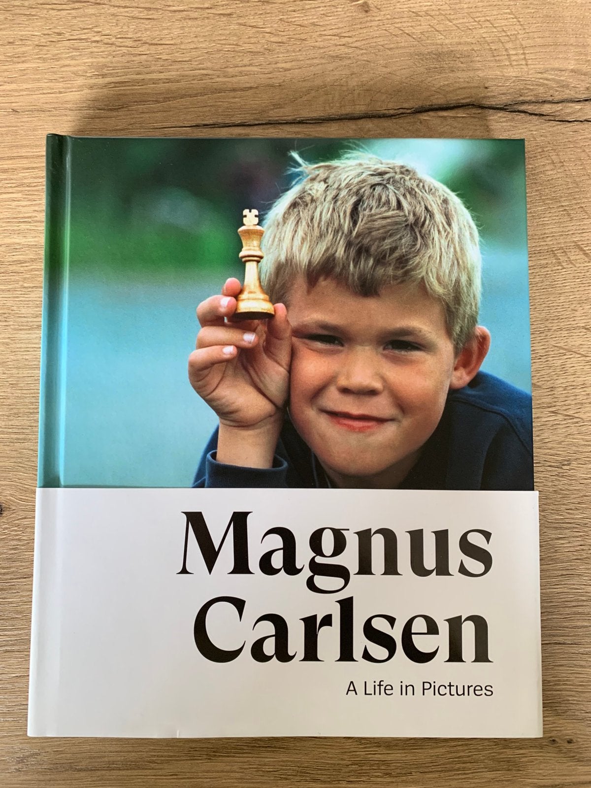 Magnus Carlsen: A Life in Pictures - Schaakboek, Boeken, Sportboeken, Ophalen of Verzenden, Nieuw, Denksport