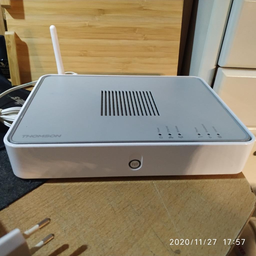 Thomson TG712 ADSL WiFi router met FXS VoIP poor, Ophalen of Verzenden, Gebruikt, Router, Thomson