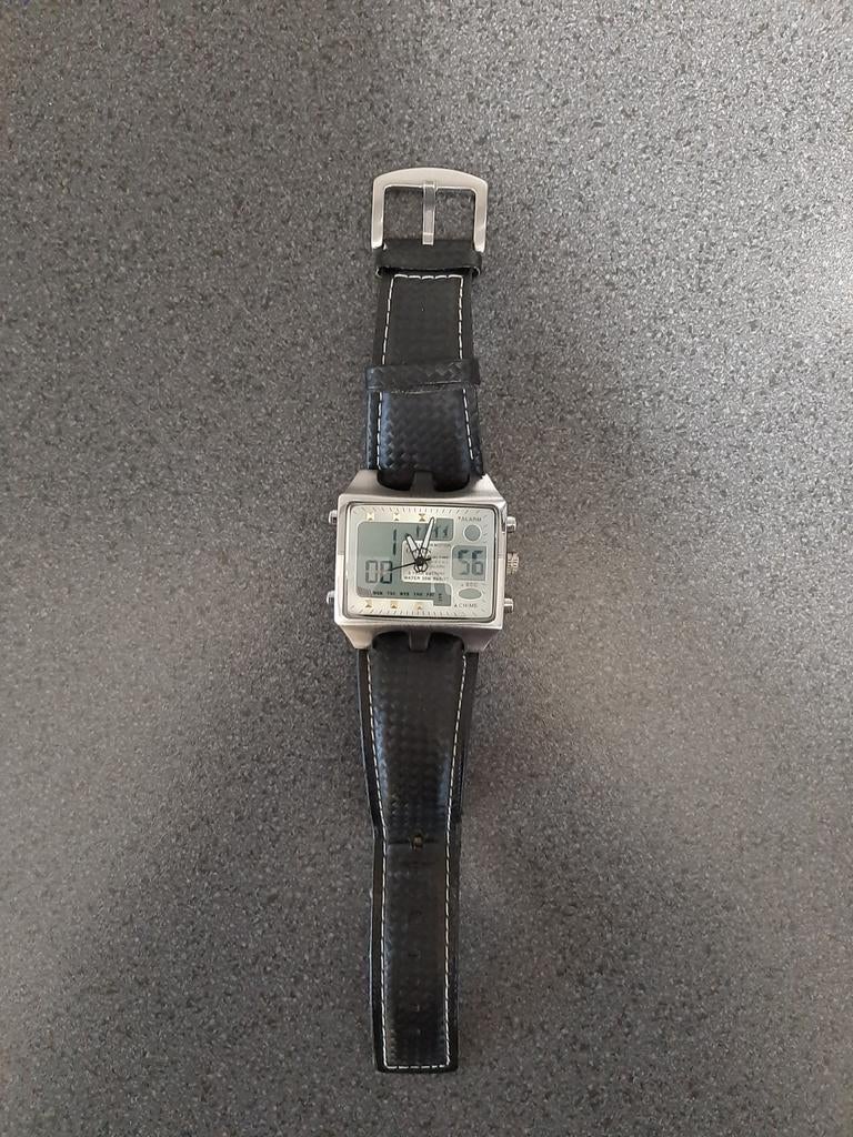 Groot apart heren horloge met duo uurwerk., Ophalen, Gebruikt, Staal, Polshorloge