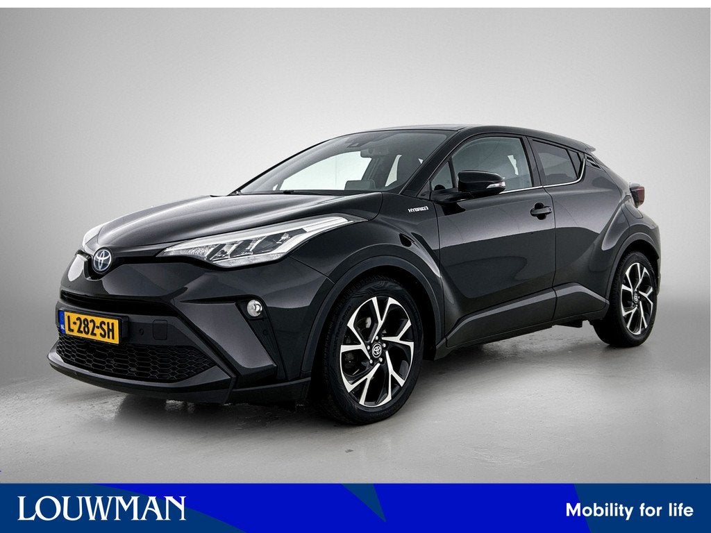 Toyota C-HR 1.8 Hybrid Bi-Tone Navigatie | Achteruitrijcamer, Auto's, Toyota, Bedrijf, Te koop, C-HR, ABS, Achteruitrijcamera
