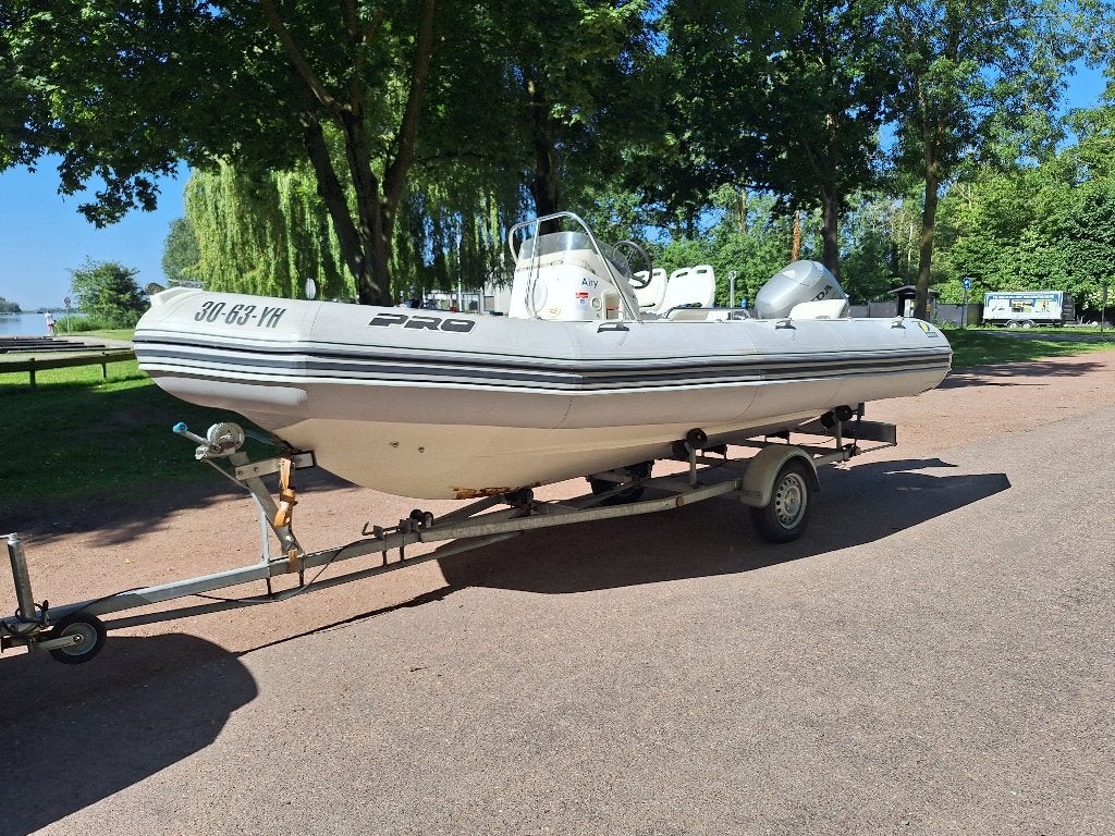 Te koop: Zodiac Pro Open 550 Rib, Watersport en Boten, Rubberboten, 70 cm, Gebruikt, Zonnedek, 5 m
