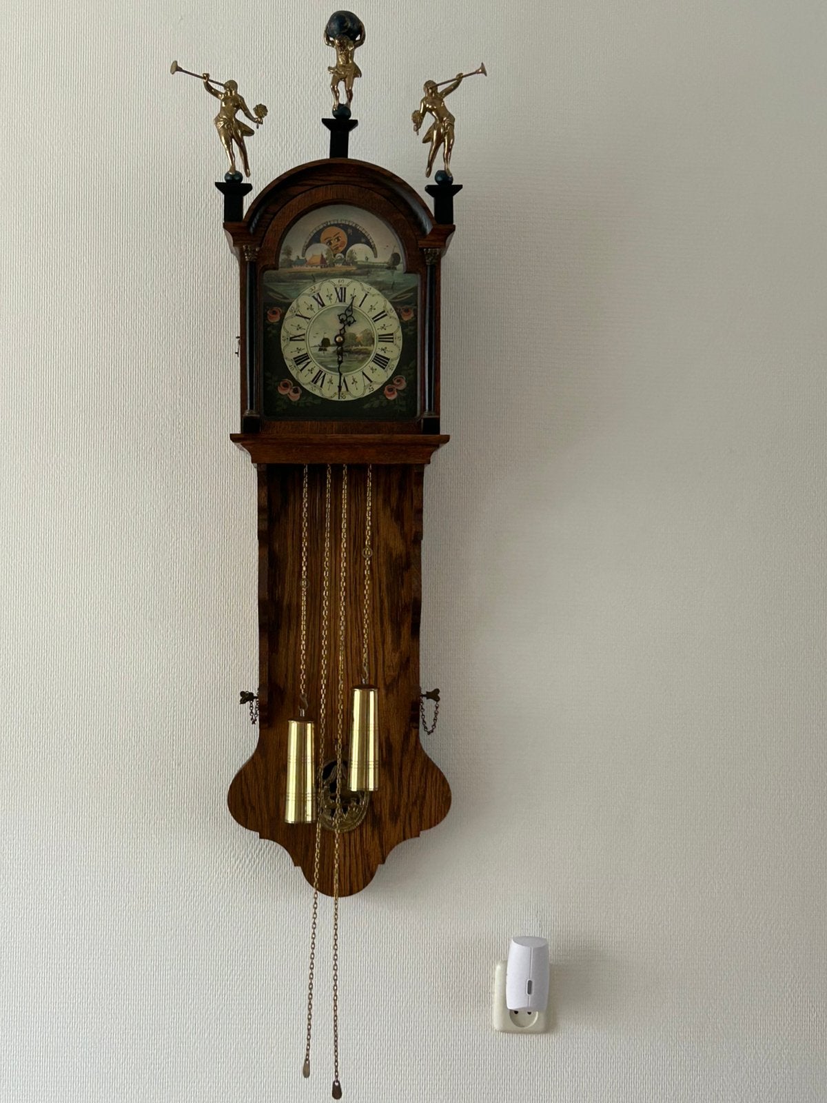 Wandklok met uurwerk, Ophalen