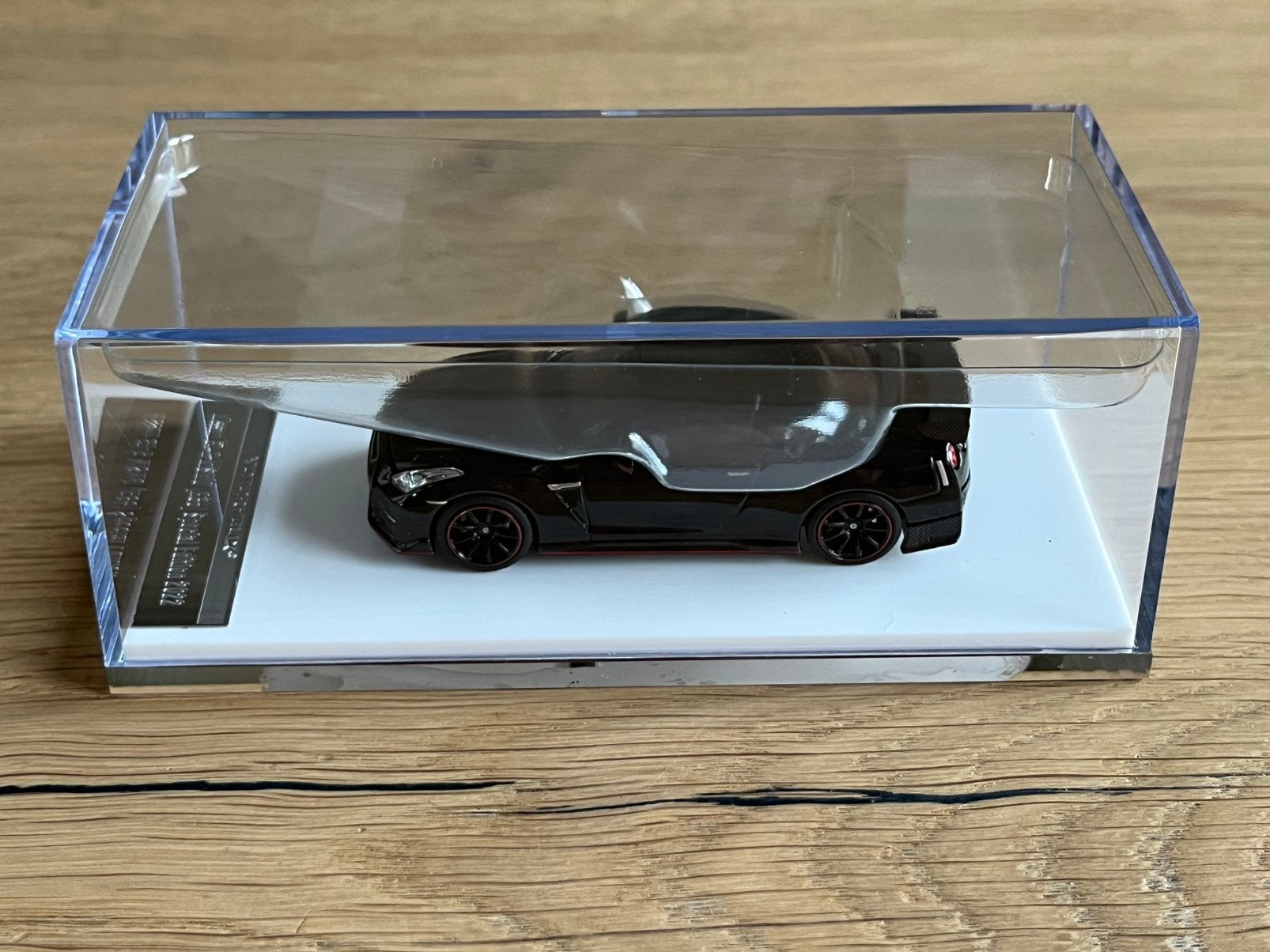 1:64 Motorhelix Nissan GT-R NISMO R35 Special Edition zwart, Ophalen of Verzenden, Nieuw, Auto
