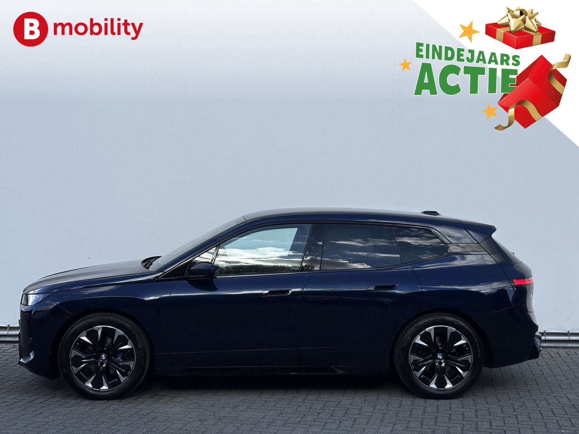 BMW iX xDrive45 101 kWh M-Sport 'Tansanitblau' Harman Kardon, Auto's, Automaat, Gebruikt, Zwart, Origineel Nederlands