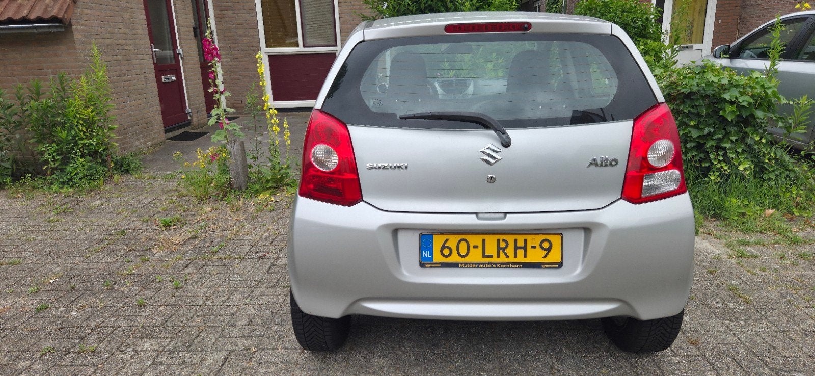 Suzuki Alto 1.0 2010 Grijs, Auto's, Suzuki, Voorwielaandrijving, Stof, 4 stoelen, Origineel Nederlands
