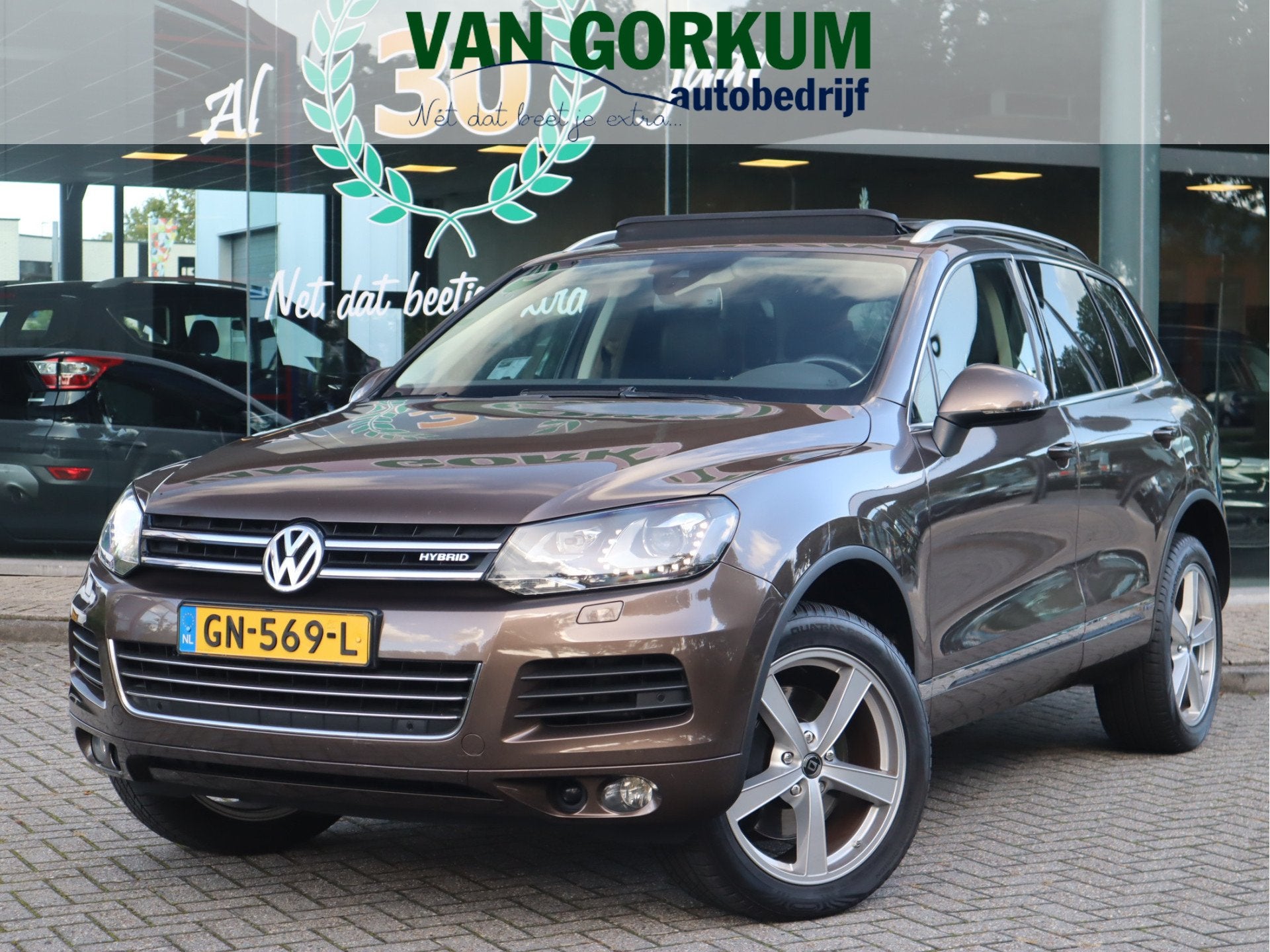 Volkswagen Touareg 3.0 TSI Hybrid Highline Navi / Luchtverin, Auto's, Automaat, Euro 5, Gebruikt, Bruin