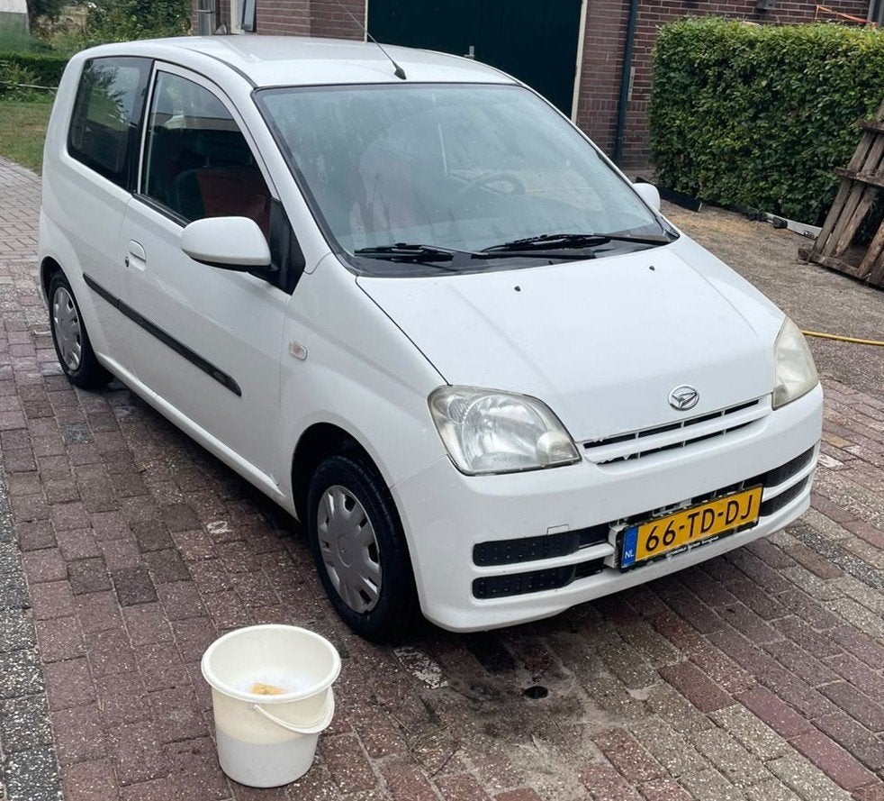 Daihatsu Cuore 1.0 3D 2006 Wit, Auto's, Stof, 600 kg, Cuore, Wit