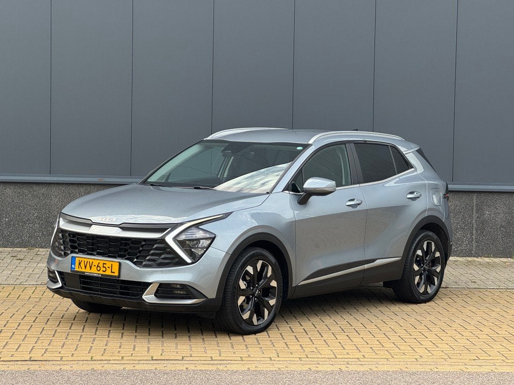 Kia Sportage 1.6 T-GDi Plug-in Hybrid AWD DynamicLine, Auto's, Automaat, Stof, Gebruikt, 4 cilinders