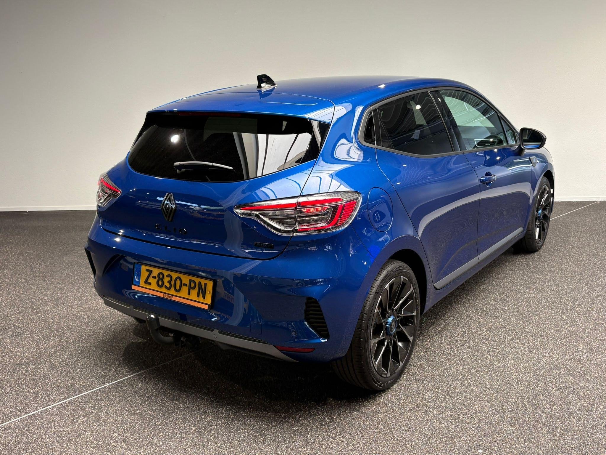 Renault Clio 1.6 E-Tech Full Hybrid 145 esprit Alpine | Trek, Auto's, Gebruikt, Met garantie (alle), Blauw, Leder en Stof