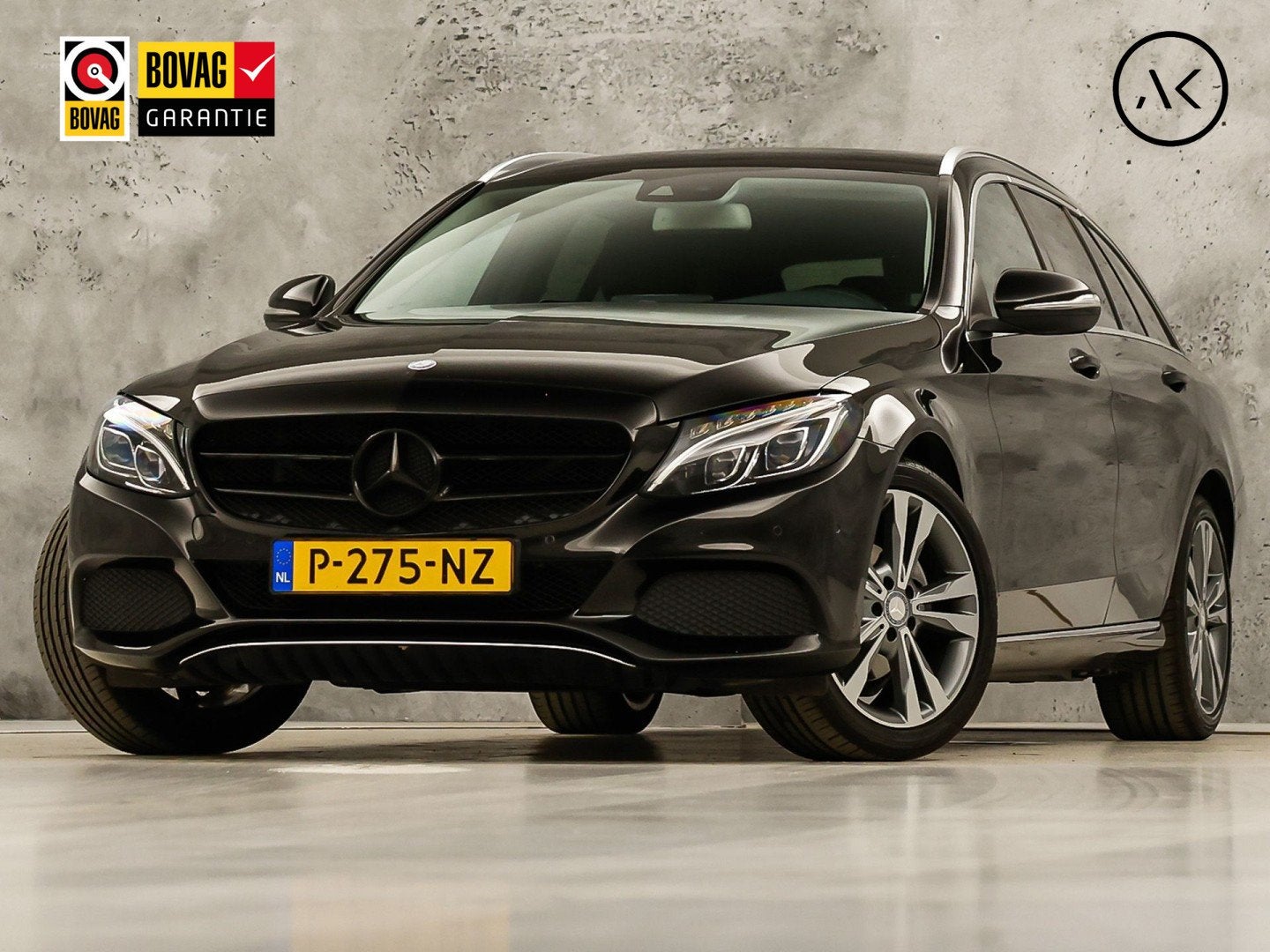 Mercedes-Benz C-Klasse 180 AMG Sport Automaat (GROOT NAVI, L, Automaat, Achterwielaandrijving, Leder en Stof, Zwart