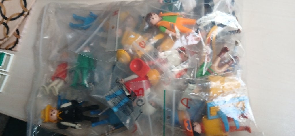 Zak vol 22 playmobil poppetjes met accessoires, Ophalen of Verzenden, Gebruikt, Losse onderdelen