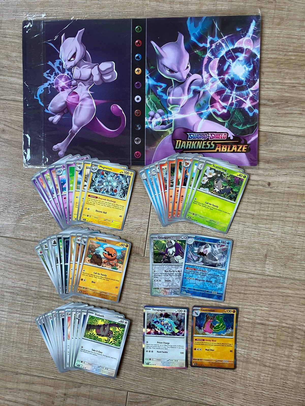 Mewtwo verzamelmap met 50 Pokémon kaarten (2 holo, 2 reverse, Ophalen of Verzenden, Gebruikt, Meerdere kaarten, Foil