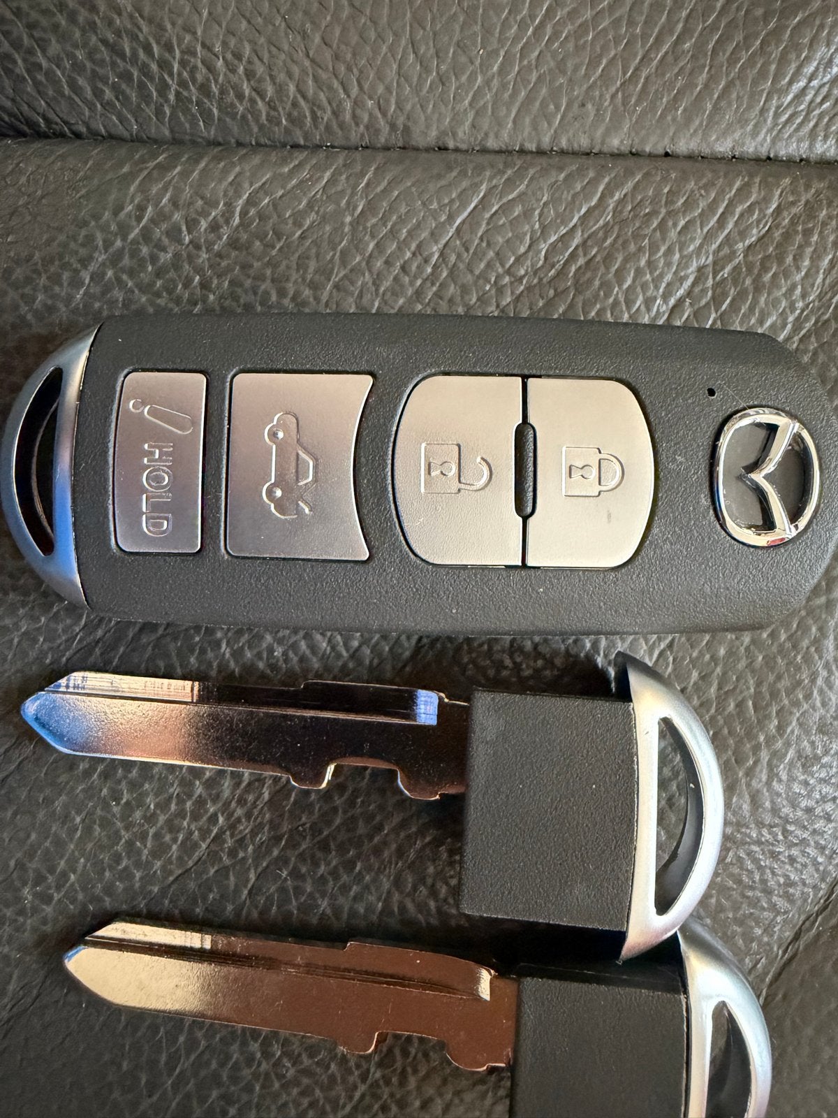 Mazda autosleutel met afstandsbediening en 2 sleutels, Ophalen of Verzenden