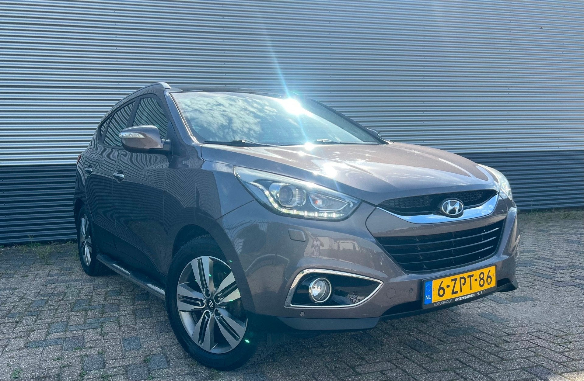 Hyundai Ix35 2.0i i-Catcher AUTOMAAT | PANO | TREKHAAK | CAM, Gebruikt, Zwart, 4 cilinders, Bruin