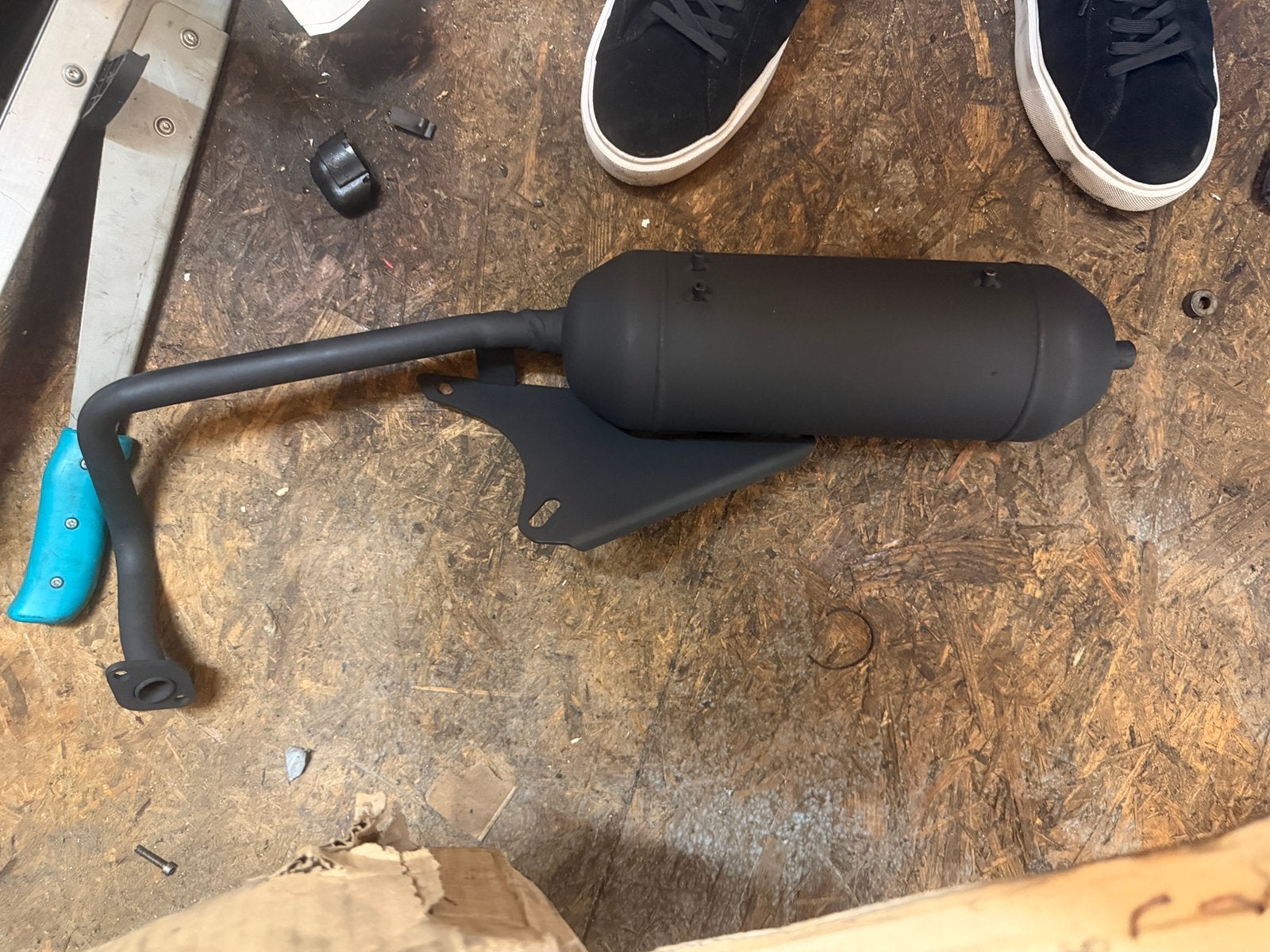 Scooter uitlaat nieuwe, Ophalen