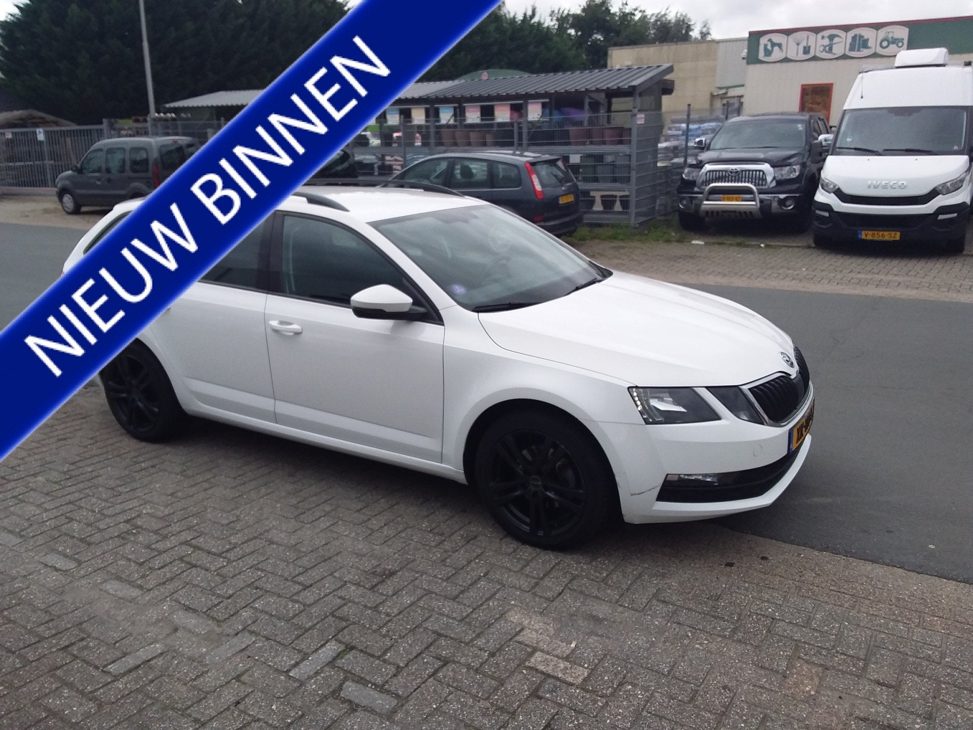 Skoda Octavia Combi 1.5 TSI Greentech Ambition Business, Auto's, Gebruikt, Euro 6, 150 pk, Wit