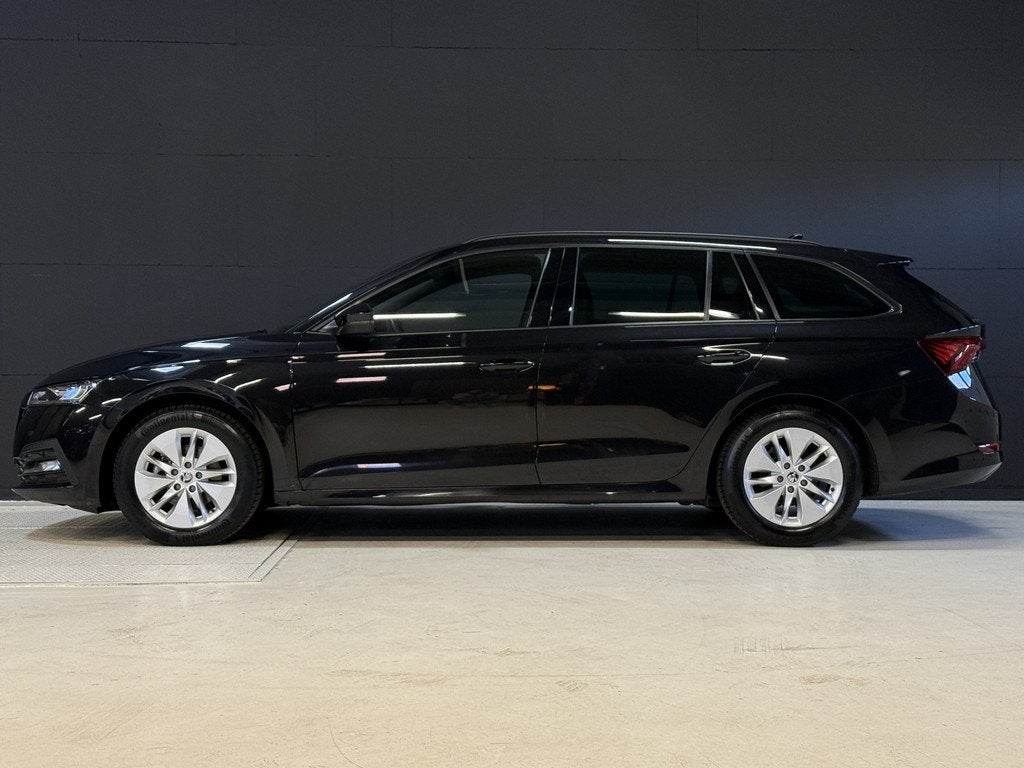 Skoda Octavia Combi 1.0 TSI Sport Business | Apple Carplay |, Voorwielaandrijving, Stof, Gebruikt, Zwart