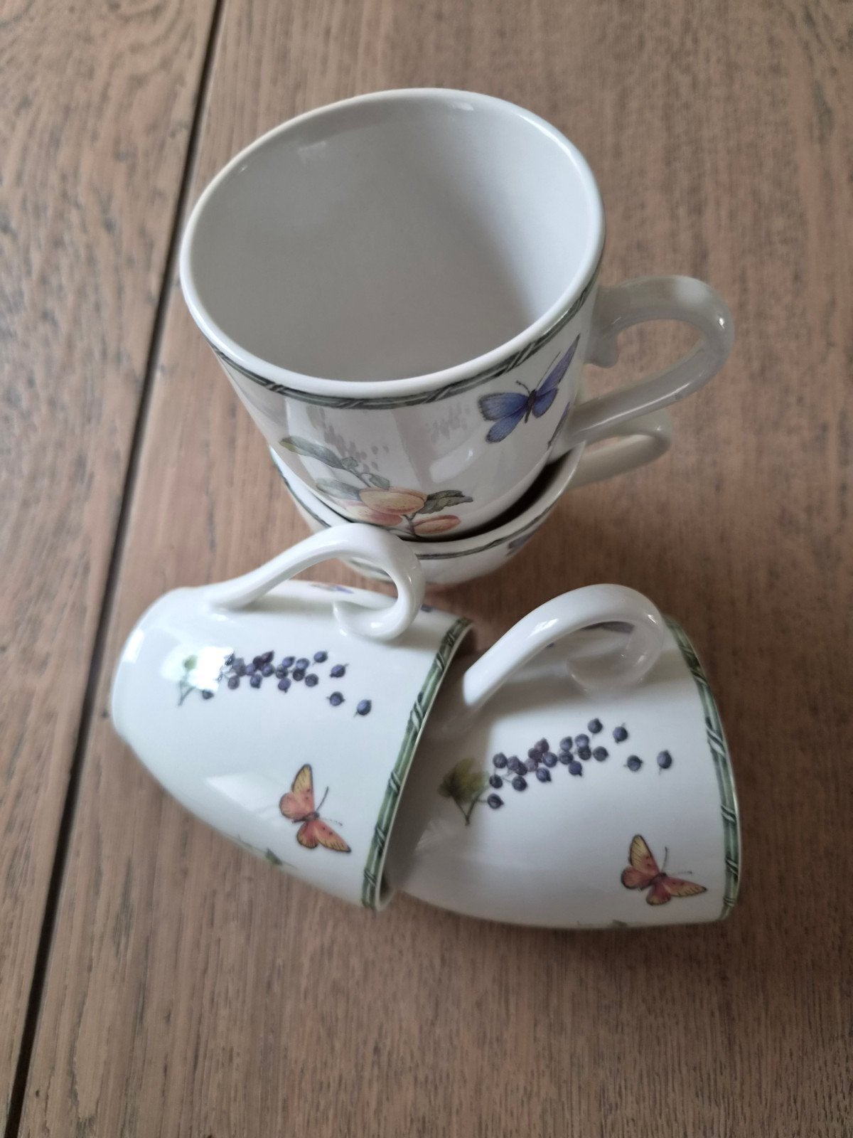 4 Janneke Brinkman mokjes +2 theetipjes, Ophalen of Verzenden, Zo goed als nieuw, Porselein, Kop en/of schotel