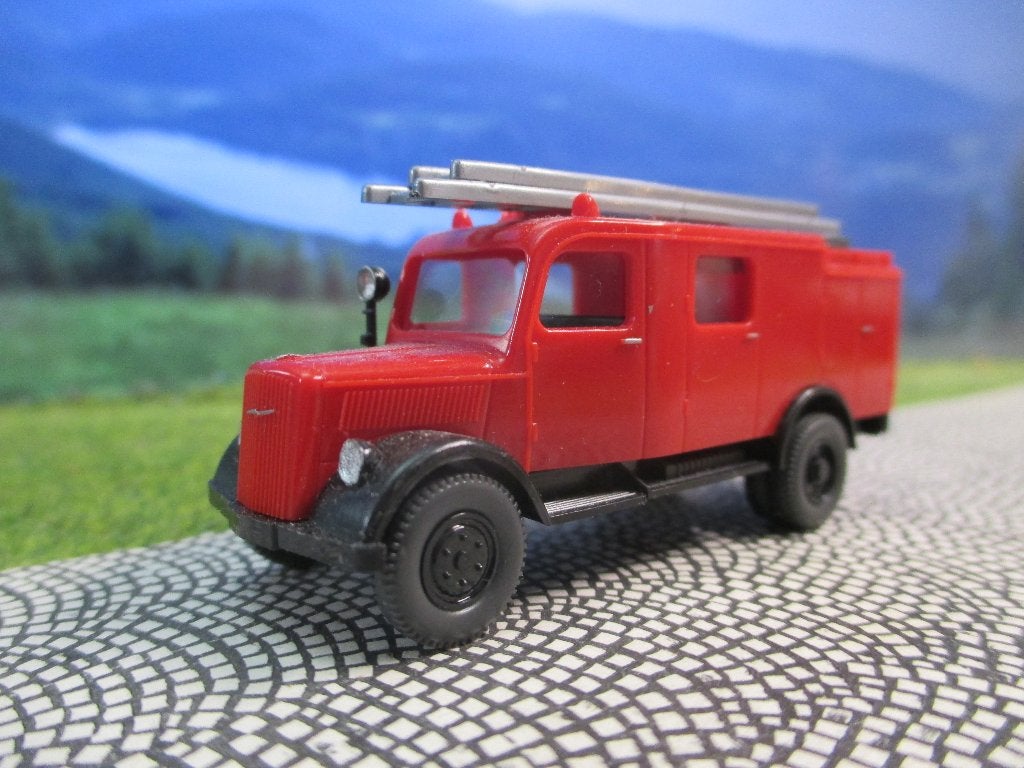 '46-'51 Opel Blitz Brandweer bluswagen licht gemodificeerd 1, Ophalen of Verzenden, Gebruikt, Bus of Vrachtwagen, Rietze