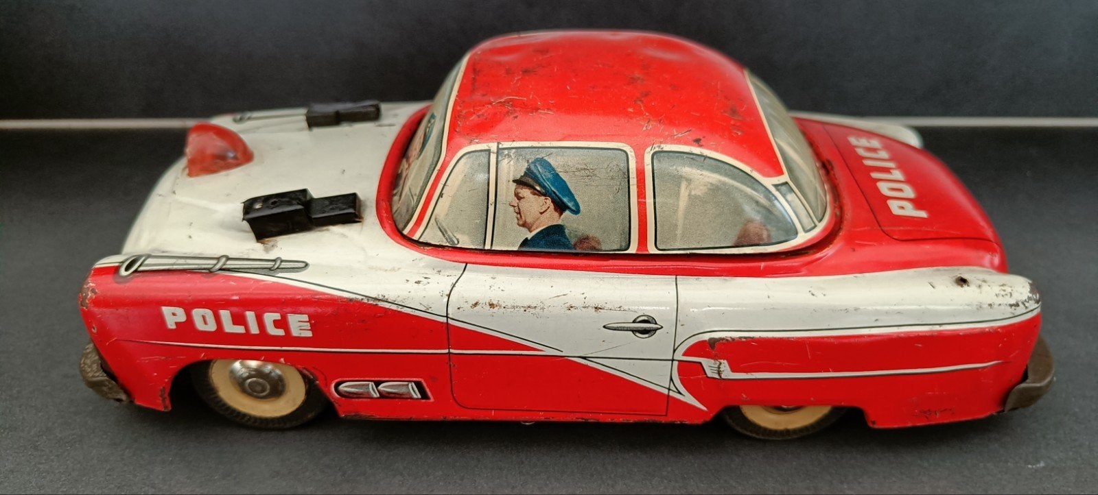 Oude blikken politieauto - Western Germany., Ophalen of Verzenden