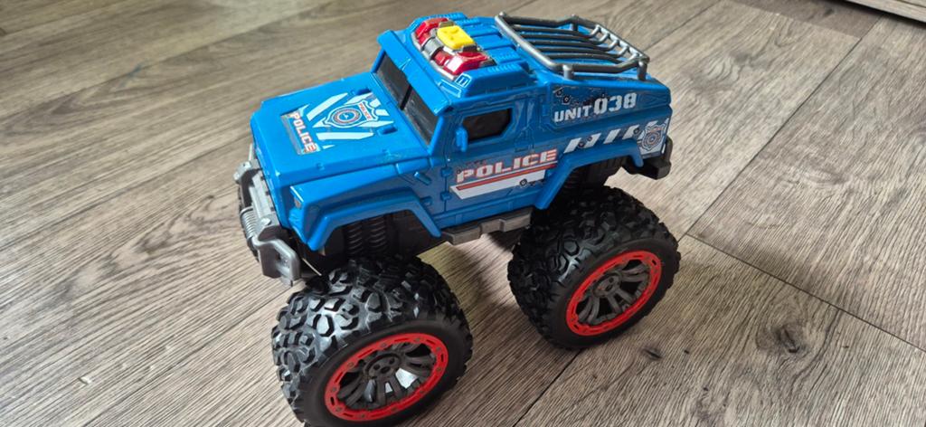 Blauwe politie monster truck speelgoedauto, Ophalen of Verzenden, Gebruikt