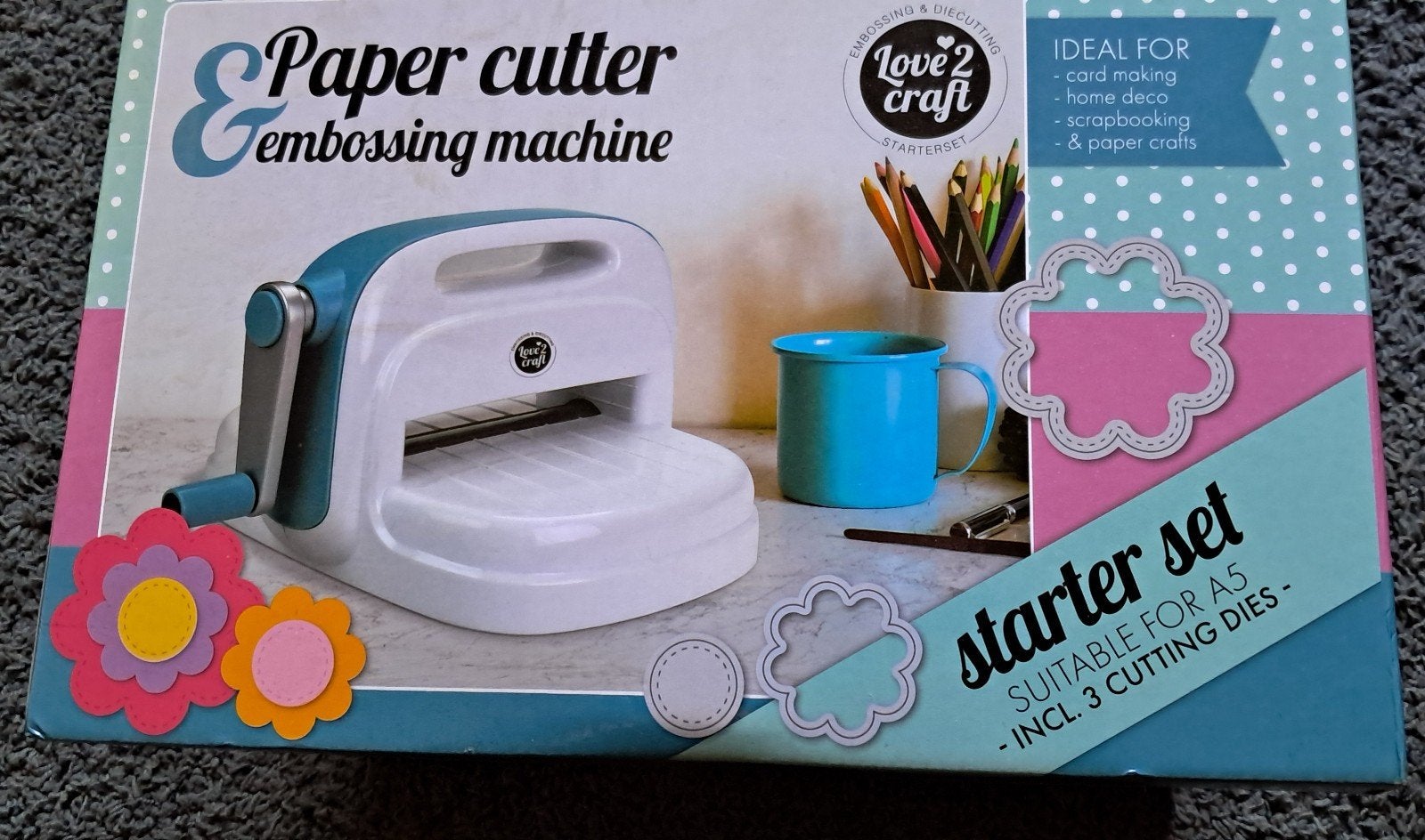 Snij - en embossingmachine., Ophalen