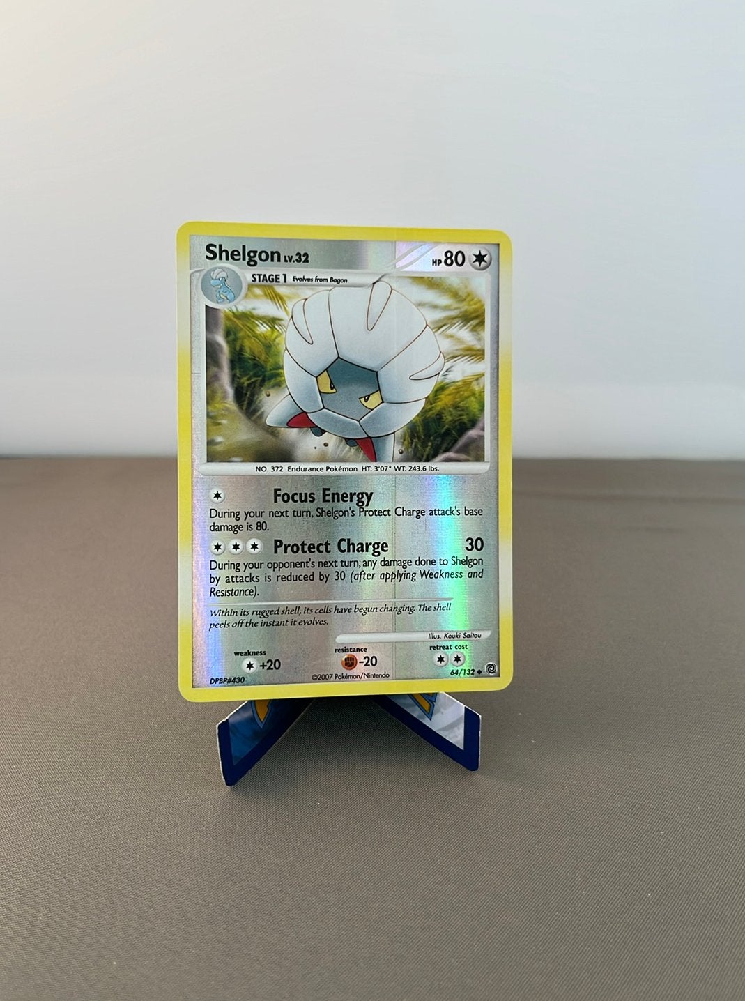 Shelgon Lv.32 (SW 64) Secret Wonders (error print line), Ophalen of Verzenden, Zo goed als nieuw, Losse kaart