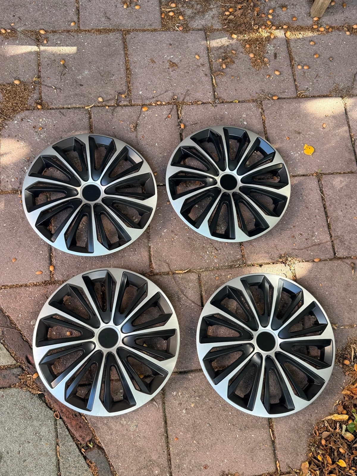 Set van 4 wieldoppen - Zilver/Zwart, Auto diversen, Ophalen of Verzenden, Gebruikt