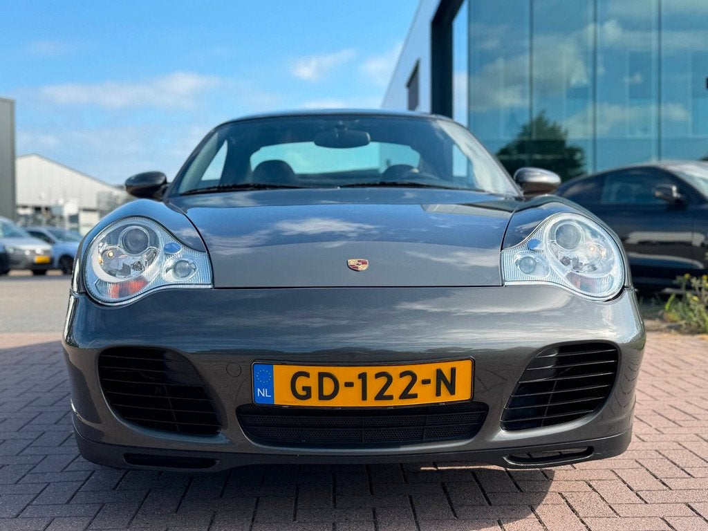 Porsche 911 Cabrio 3.6 Carrera 320PK Aero Pack Af fabriek 1e, Auto's, Porsche, Automaat, Achterwielaandrijving, Gebruikt, Zwart